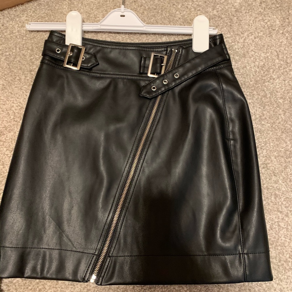 Black leather mini skirt